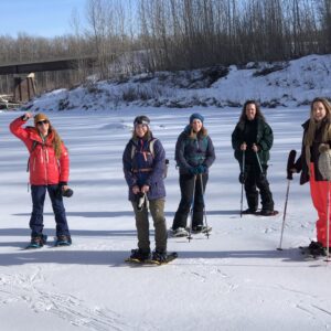 Friends snowshoeing